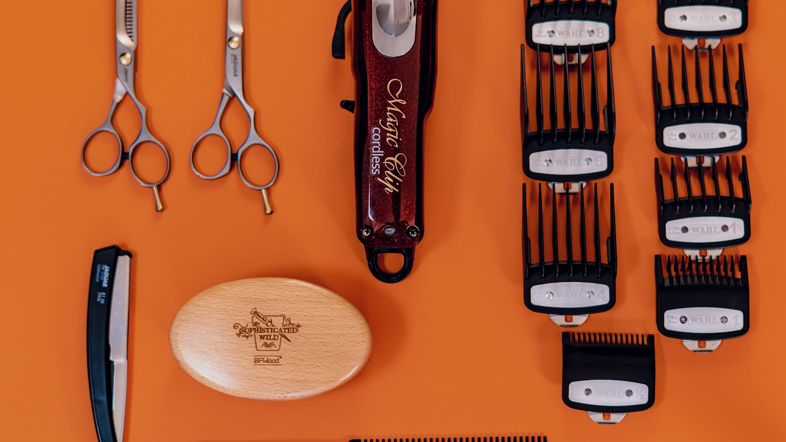 Stainless steel scissors and a hair comb